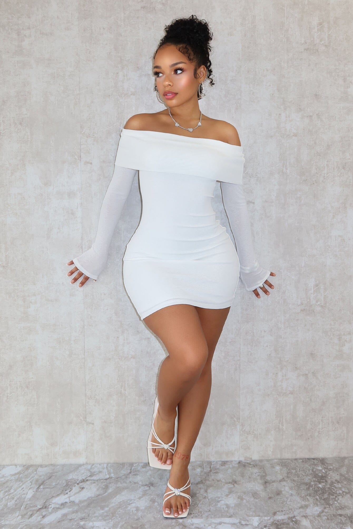 A Classic Off Shoulder Long Sleeve Mini Dress